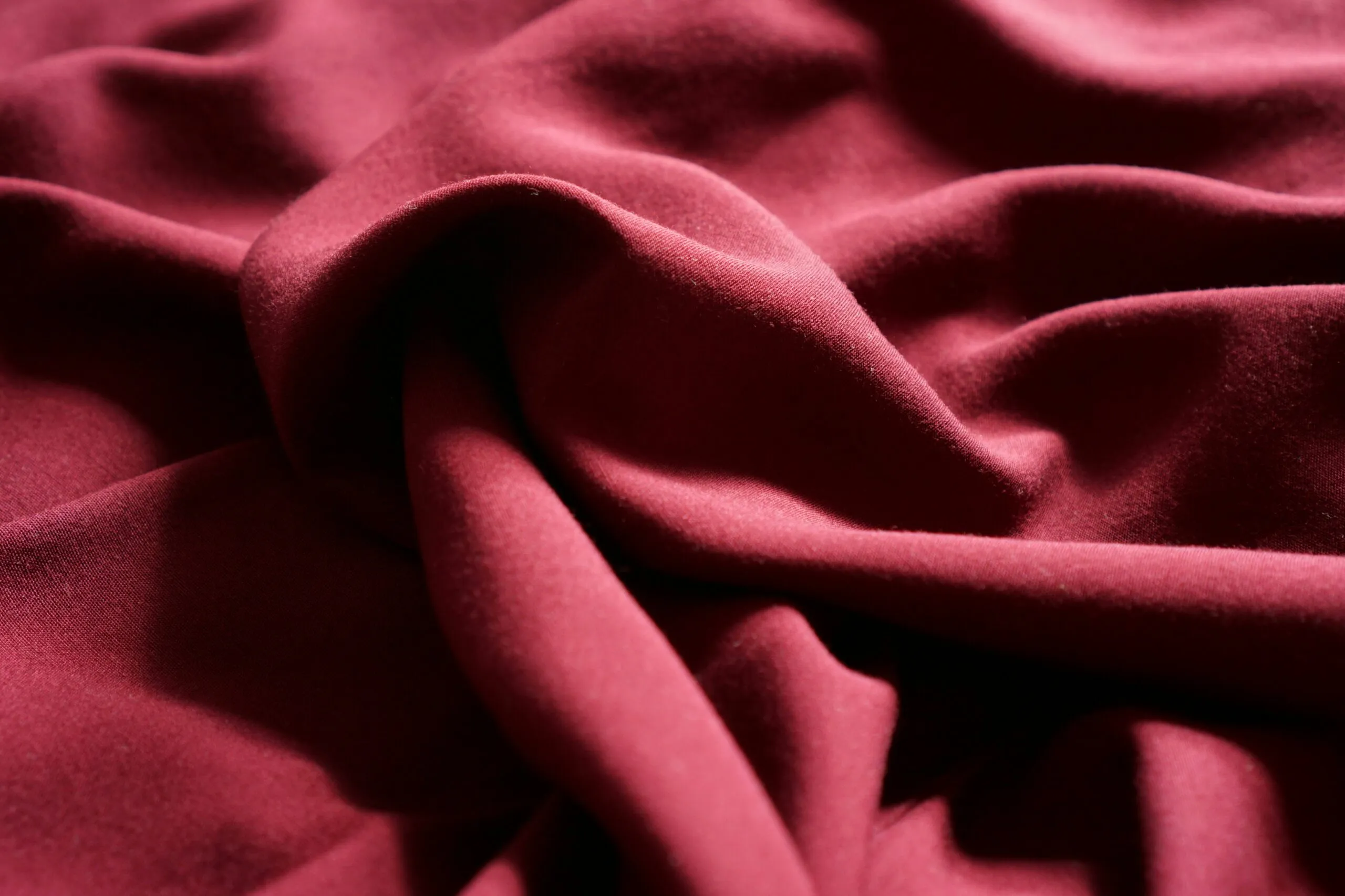 a close up view of a red fabric