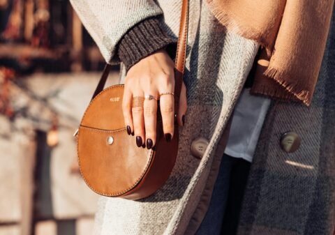 a person holding a purse